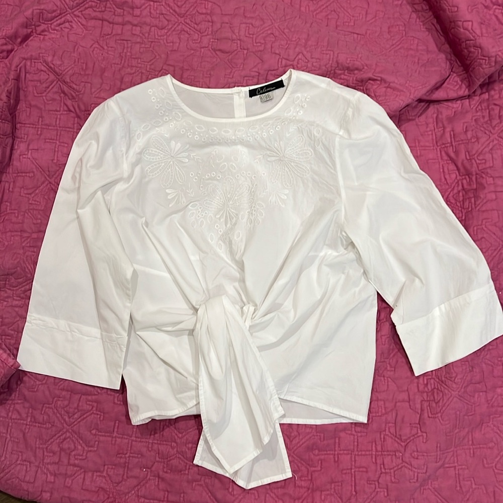 Crisp white embroidered top with tie waist